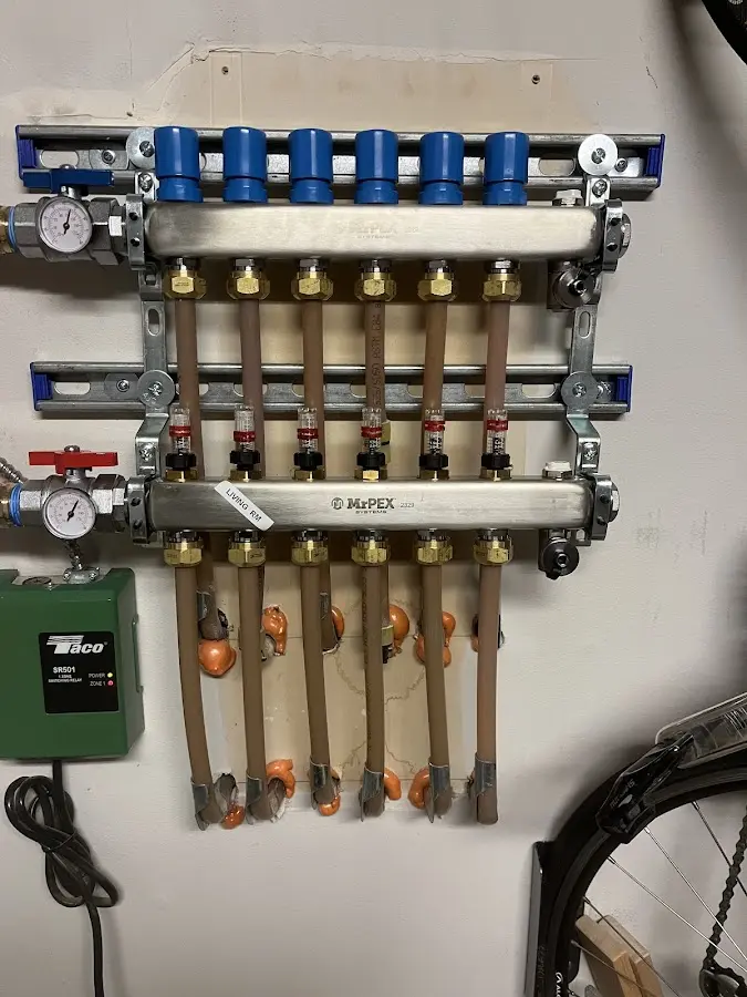 Plumber performing Water Heater Repair at a residential property in Lynchburg